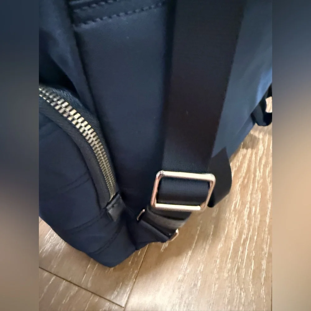 Tumi Navy Quilted Backpack with Gold Hardware